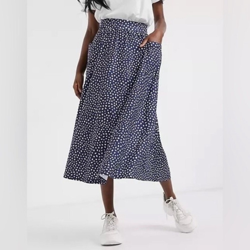 ASOS DESIGN midi skirt with pockets in light pink on blue polka dot